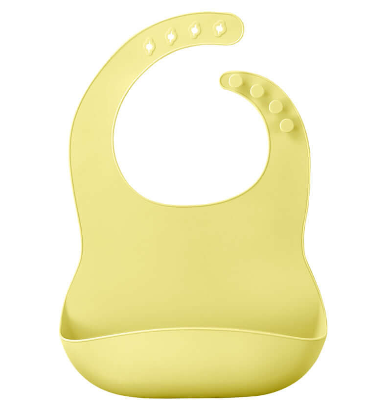 Light yellow soft silicone baby bib with catch-all pocket for mess-free, easy-clean mealtimes.
